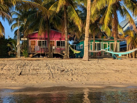 Hot Pink and Teal Cabanas, Caribbean Beachfront in the heart of Hopkins village.