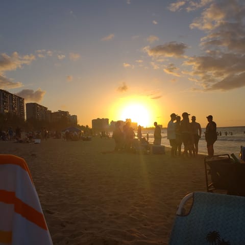 On the beach, sun loungers, beach towels