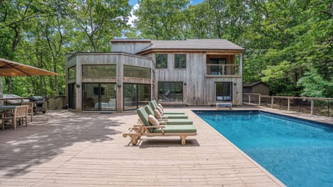 A heated pool, sun loungers