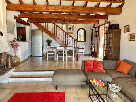 Indoor dining room table and lounge with flow to the outdoor patio