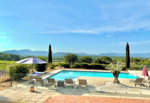 Beautiful pool with glass safety fence surrounding the pool