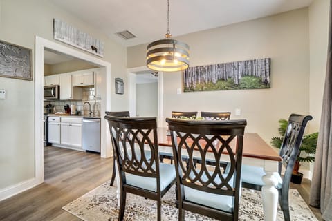 Sit and dine with family in this beautiful dinning room.