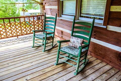 Enjoy the sounds of nature out on the main level deck in these rocking chairs.