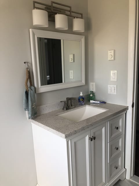 Bathtub, jetted tub, hair dryer, towels