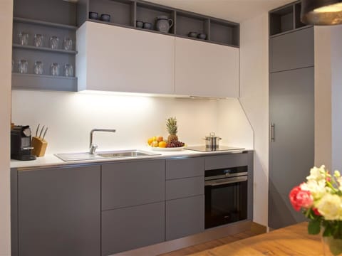 Cabinetry, Property, Countertop, Sink, Flower, Kitchen, Kitchen Sink, Kitchen Stove, Interior Design, Wood