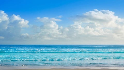 On the beach, sun loungers, beach towels