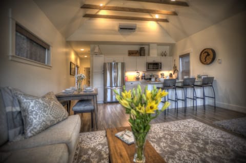 View facing kitchen and hallway. High Ceiling at Carpenter Cottage