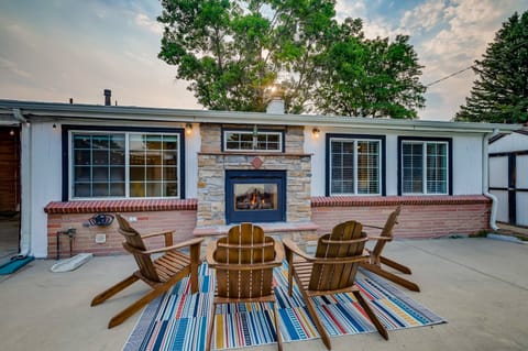 Indoor/outdoor gas fireplace and adirondack chairs, fire starts w/flip of switch