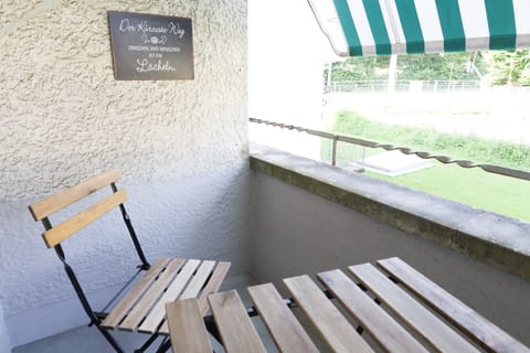 Balcony facing backyard.