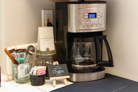 Drip coffee maker with Peet's coffee. A bean grinder is also available.