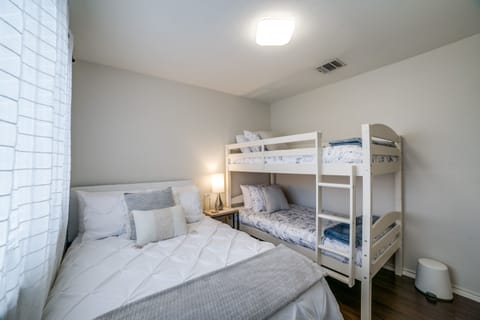 Enjoy bunk beds and full size bed. All new!