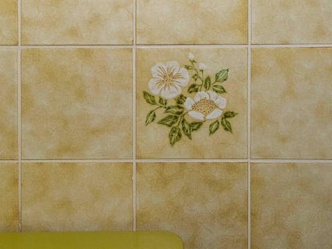 Flower, Plant, Textile, Rectangle, Beige, Font, Pattern, Flooring, Symmetry