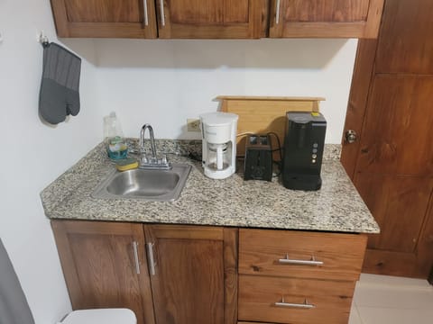 Microwave, coffee/tea maker, cookware/dishes/utensils