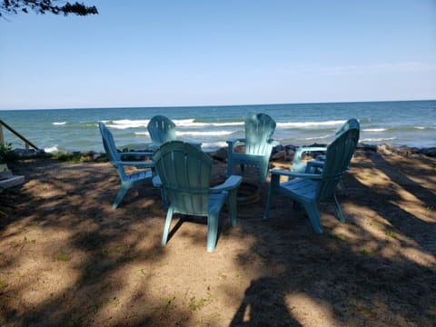 On the beach, sun loungers, beach towels