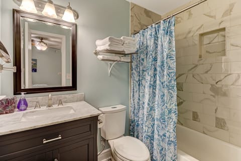 Combined shower/tub, hair dryer, towels, soap