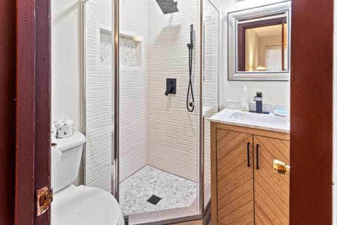 Combined shower/tub, hair dryer, towels, soap