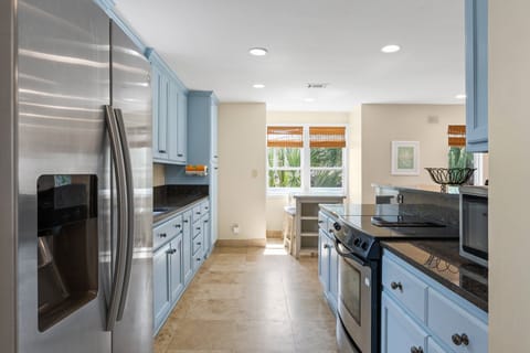 All major appliances and fully stocked kitchen for a big family meal.