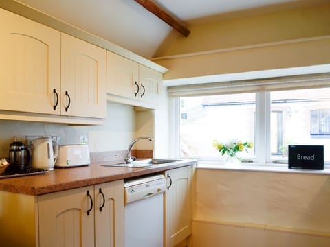 Kitchen | Cranberry Cottage - Celtic Haven Resort, Lydstep, near Tenby