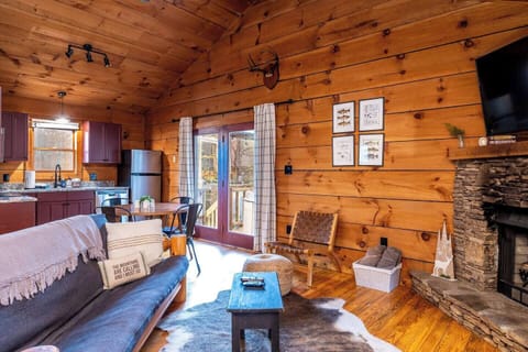 Comfortable futon sofa to warm up in front of the fireplace in the cooler months (Oct. - Mar.)