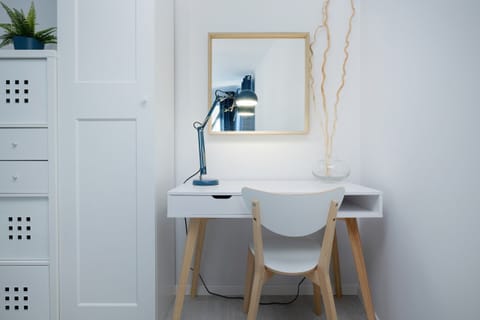 A comfortably arranged place to study and work in front of a computer.