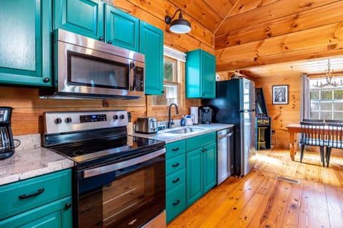 Full kitchen equipped with Keurig, drip coffeemaker, & pots/pans/dishes