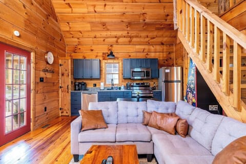 Your open-concept living space is warm and inviting.