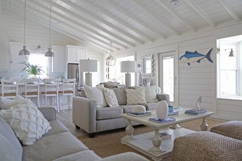 Large, open living area with vaulted ceiling and lots of natural light