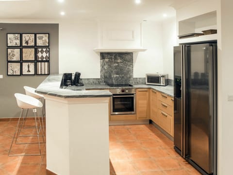 Cabinetry, Furniture, Countertop, Building, Kitchen, Kitchen Appliance, Home Appliance, Wood, Kitchen Stove, Flooring