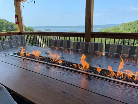 Enjoy dinner and a fire outside on the main level deck.