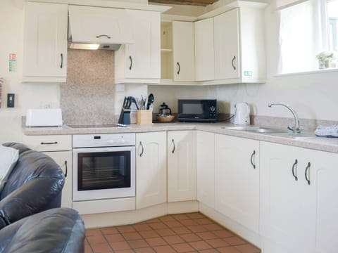 Kitchen area | The Parlour - Celtic Haven Resort, Lydstep, near Tenby