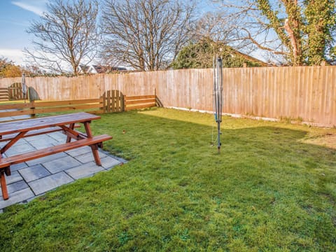 Garden | Gatekeepers Cottage - Celtic Haven Resort, Lydstep, near Tenby