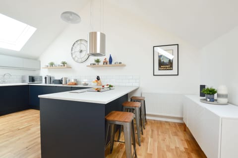 Birch House, St Agnes. First floor: Including an electric oven and hob, microwave, coffee machine, dishwasher, fridge/freezer and washing machine