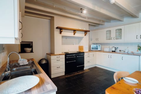 Kitchen/diner | The Manor House - Celtic Haven Resort, Lydstep, near Tenby