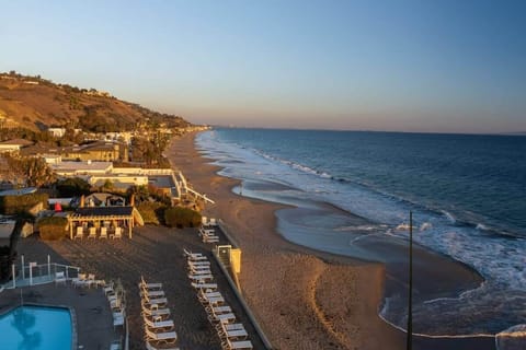 On the beach, sun loungers, beach towels