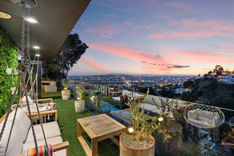 Experience the height of luxury living with panoramic views of LA.