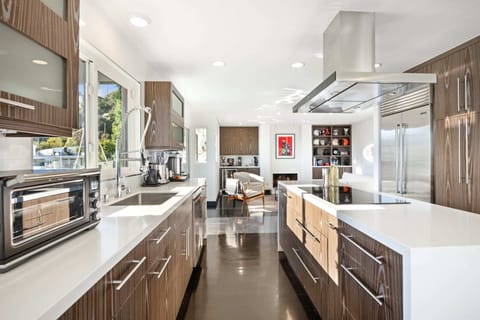 Live like a celebrity in our opulent Hollywood Hills villa.