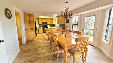 View of dining and kitchen from living room