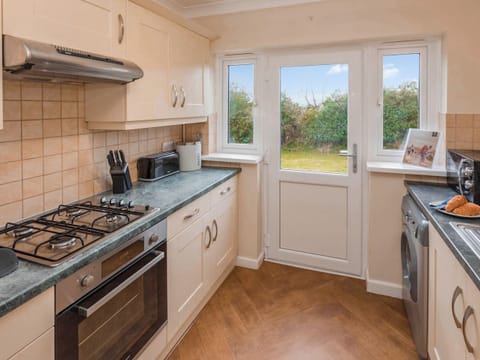 Kitchen | Watch Cottage - Celtic Haven Resort, Lydstep, near Tenby