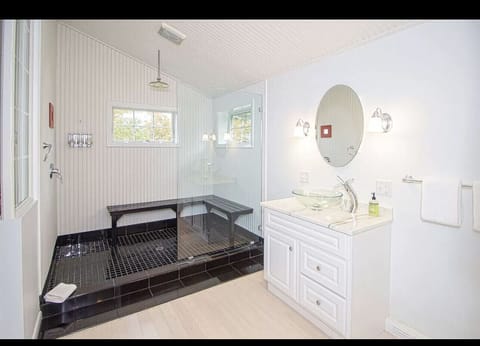 Combined shower/tub, hair dryer, towels, toilet paper