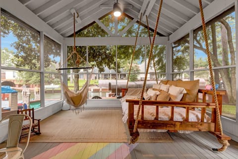 Enjoy being waterfront in this beautiful screened in porch. Coffee and a sunrise