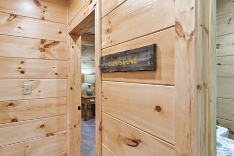 Upstairs room, king bed and walk in shower en suite bathroom. Each room has deck access too!