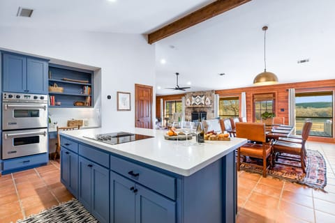 Updated kitchen with large island with dining for 4