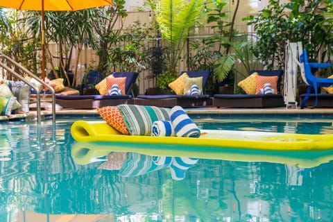 A rooftop pool, sun loungers