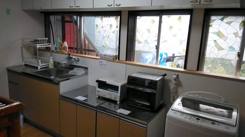 Fridge, microwave, cookware/dishes/utensils