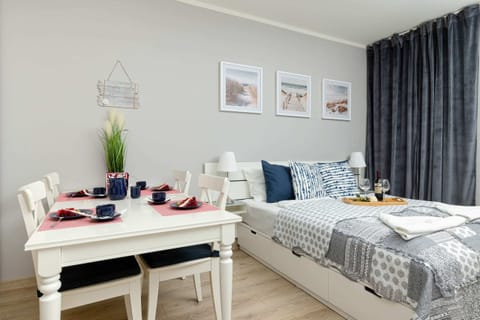 Large table with chairs for eating communal meals. 