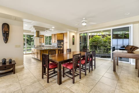 Indoor dining for up to 8 guests, with seamless flow to the lanai and ocean breeze.