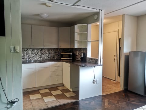 Private kitchen | Fridge, microwave, coffee/tea maker, dining tables