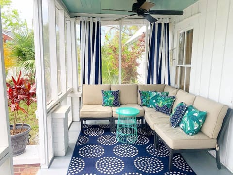 Enjoy a morning coffee or an afternoon cocktail on the comfortable front porch