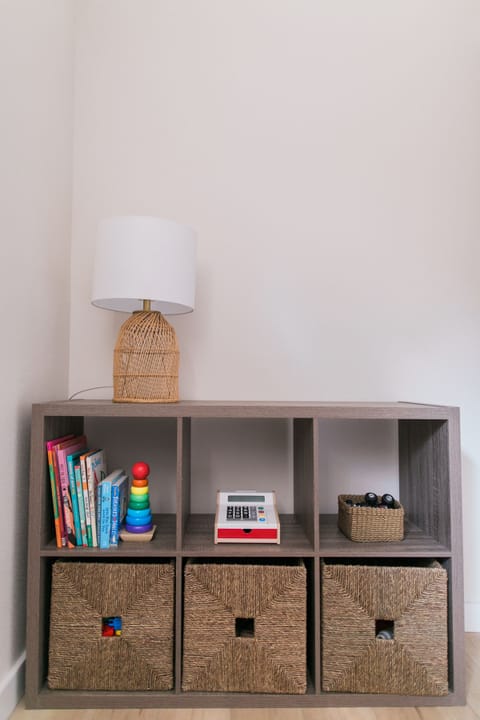 Kids play nook with toys and books provided for littles.