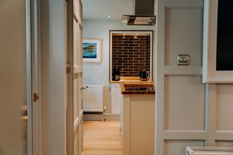 View from the lounge into the kitchen